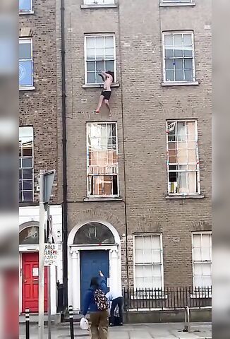 Crazed Man Falls Out Of Window Onto Spiked Fence