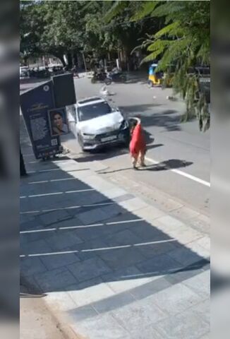 Out Of Control Car Slams Into Unlucky Pedestrian From Behind