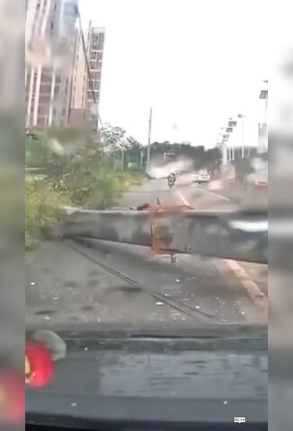 Large Crane Falls On Top Of Unsuspecting Moped Rider