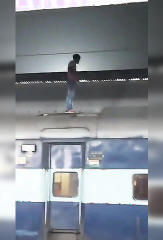 Suicidal Indian Man Grabs Overhead Train Wire