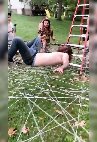 Redneck Jumps Onto A Barbed Wire Trampoline