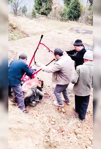 Man Becomes One With Farm Machinery