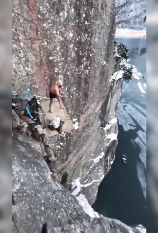 Insanely High Jump Into A Freezing Lake