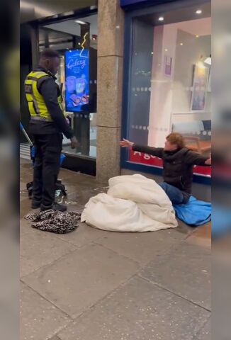 Asshole McDonalds Security Guard Throws Water On Homeless Mans Blankets