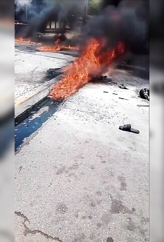 Electricity Worker Dying In The Street After Transformer Explosion