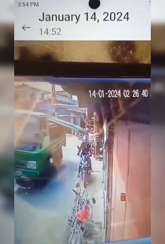 Unlucky Biker Gets Slammed By Loose Load Of Metal Sheets