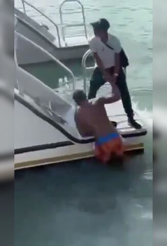 Dude Trying To Climb Onto Party Boat Gets Sucked Into The Prop