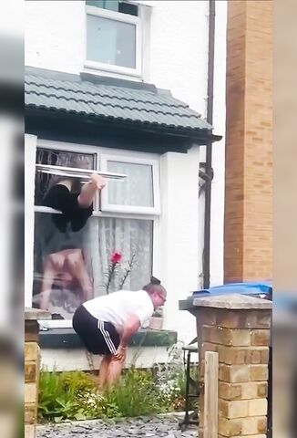 British Woman Gets Stuck In Her Window