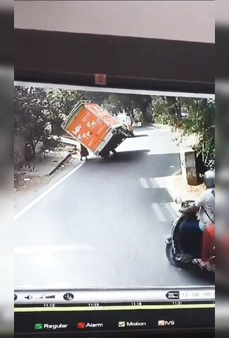 Truck On Two Wheels Kills Unlucky Pedestrian