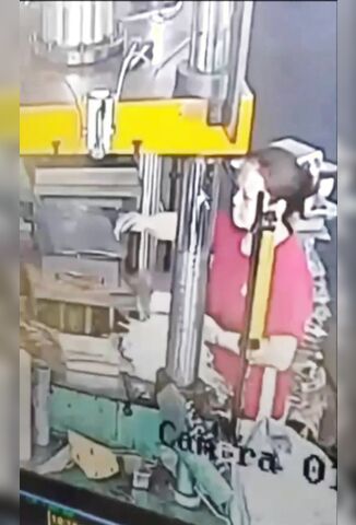 Worker Has Her Entire Arm Crushed When She Leans On The Button