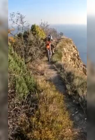 Biker Falls Off A Cliff To His Death