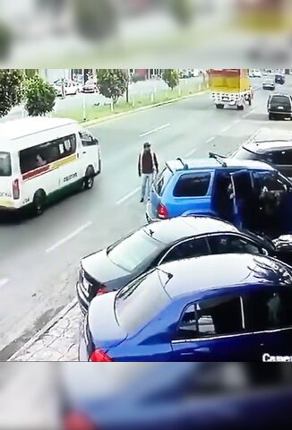 Car Reverses A Man Under A Passing Truck