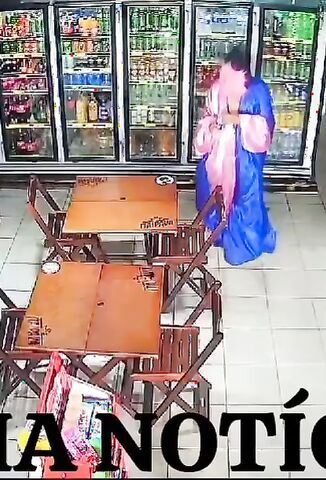 Man Dressed In A Weird Costume Executes The Shopkeeper