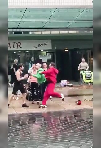 Man In Red Tracksuit Punches Out In Some Shithole UK Town