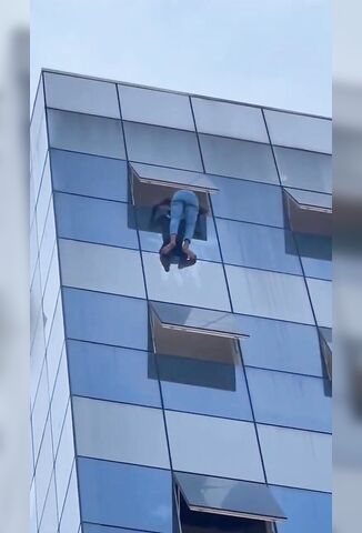 Man Jumps Backwards From Apartment Window To A Brutal Impact