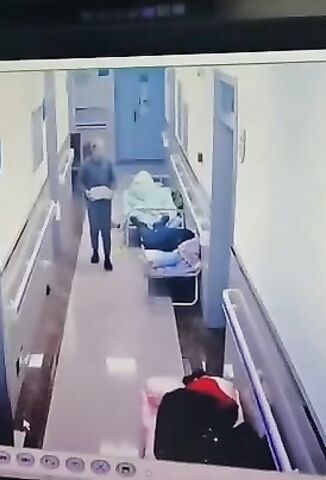 Nutcase Enters Hospital Corridor And Caves In Patients Heads With A Breeze Block