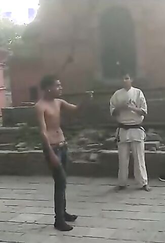 Shirtless Nepalese Dude Challenges Black Belt To A Fight