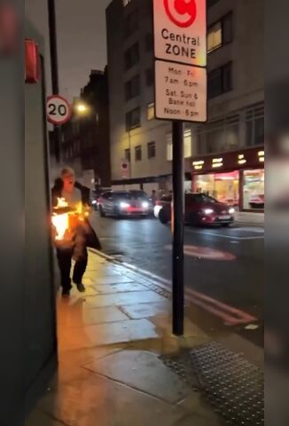 Man Running Down London Street After Being Set On Fire