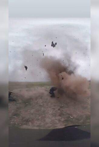 Soldiers Approach a Suicide Bomber Just As He Detonates
