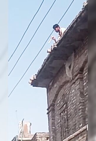 Roof Worker With Careless Safety Rules Electrocuted On Overhead Power Lines