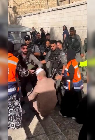 Israeli Officer Pushes Over Elderly Muslim Smashing His Skull On The Stairs