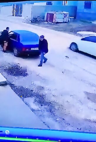 Two Russians Throw A Cigarette Down A Gas Hole And It Explodes