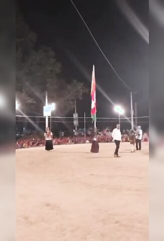 Dancing Girl Celebrating Something Killed When Her Flag Touches Overhead Power Line