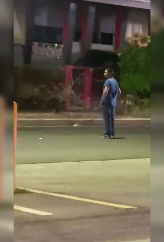 Drunk Man Runs Towards An Oncoming Car