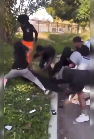 Seven Guys Jump One In Street Beef