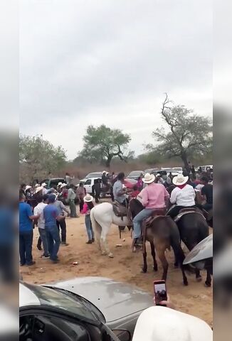 Mexican Racegoer Stands Right In The Path Of A Speeding Horse