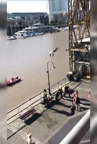 Depressed Man Suicide Belly Flops From Dockside Crane