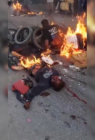 Haitian Police Round Up Gang Members So Townsfolk Can Set Them On Fire