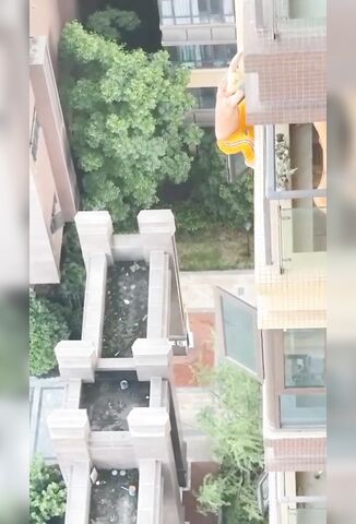 Blonde Haired Chinese Man Jumps To His Death Backwards