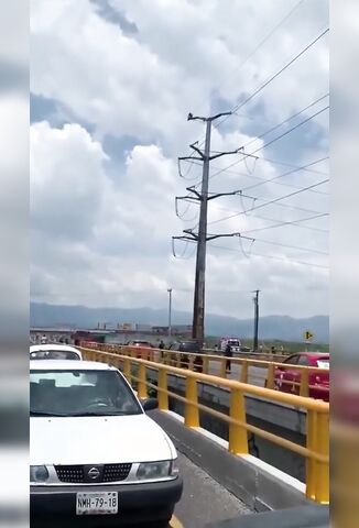 Man Threatening To Jump From Power Lines Makes Good On His Promise