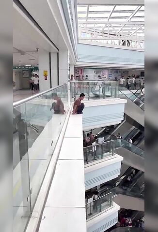 Sad Depressed Man Ends His Life From Top Floor Of The Mall