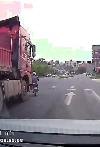 Scooter Rider In Vietnam Popped Riding In The Trucks Blind Spot