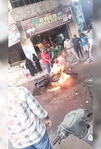 Crashed Motorcycle Explodes As Men Try To Extinguish The Flames