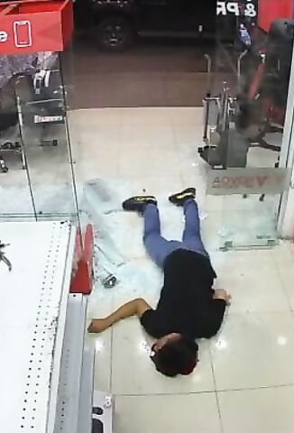 Security Guard Shot In The Head Bleeds Out On The Store Floor