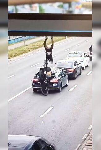 Bikers Say Hello To A Car Stopped In Traffic