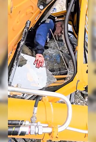 Construction Worker Just Needs A Light As He Bleeds Out In The Crane Cab