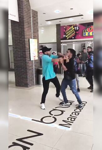 Man In Blue Shirt Body Slams Dude Into Brain Damage