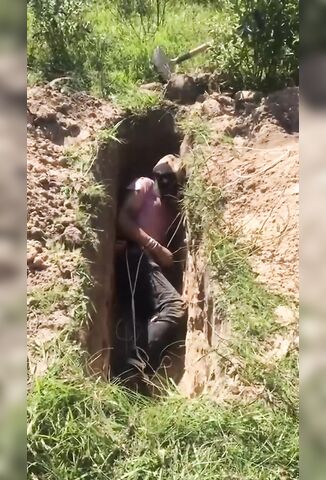 Man Forced Into A Shallow Grave Then Executed In It