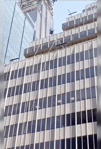 You're Fired - Nutter Throwing Furniture Onto Street From High Rise Office Block