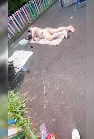 Man Sunbathing In The Children's Playground Isn't Happy About Being Disturbed