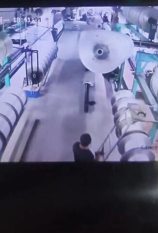 Industrial Cotton Reel Malfunctions Squashing Unsuspecting Worker