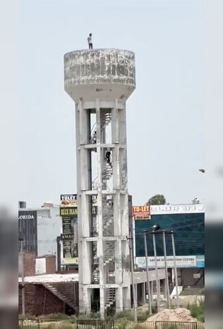 Man Suicides From The Top Of Tall Tower