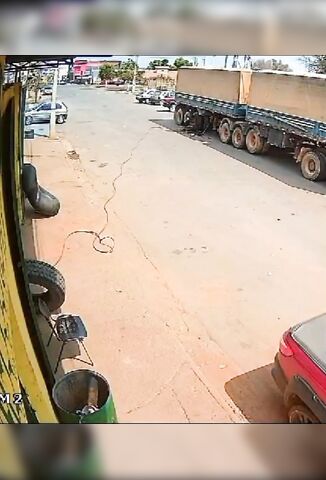 Mans Head Explodes As Truck Tyre Explodes And Sends Him Across The Street