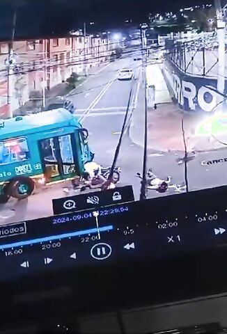 Three Up On A Scooter Had On With A Bus