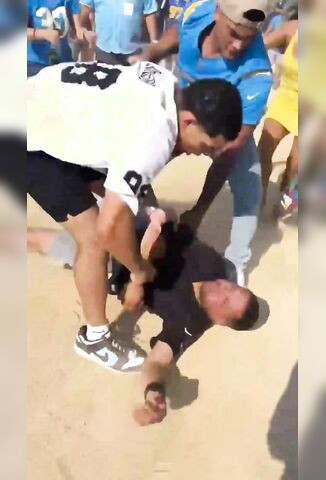 Raiders Fan Gets Knocked Out And His Bitch Bodyslammed Too