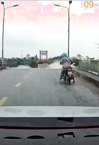 Bridge Collapses In Vietnam As Truck And Moped Cross